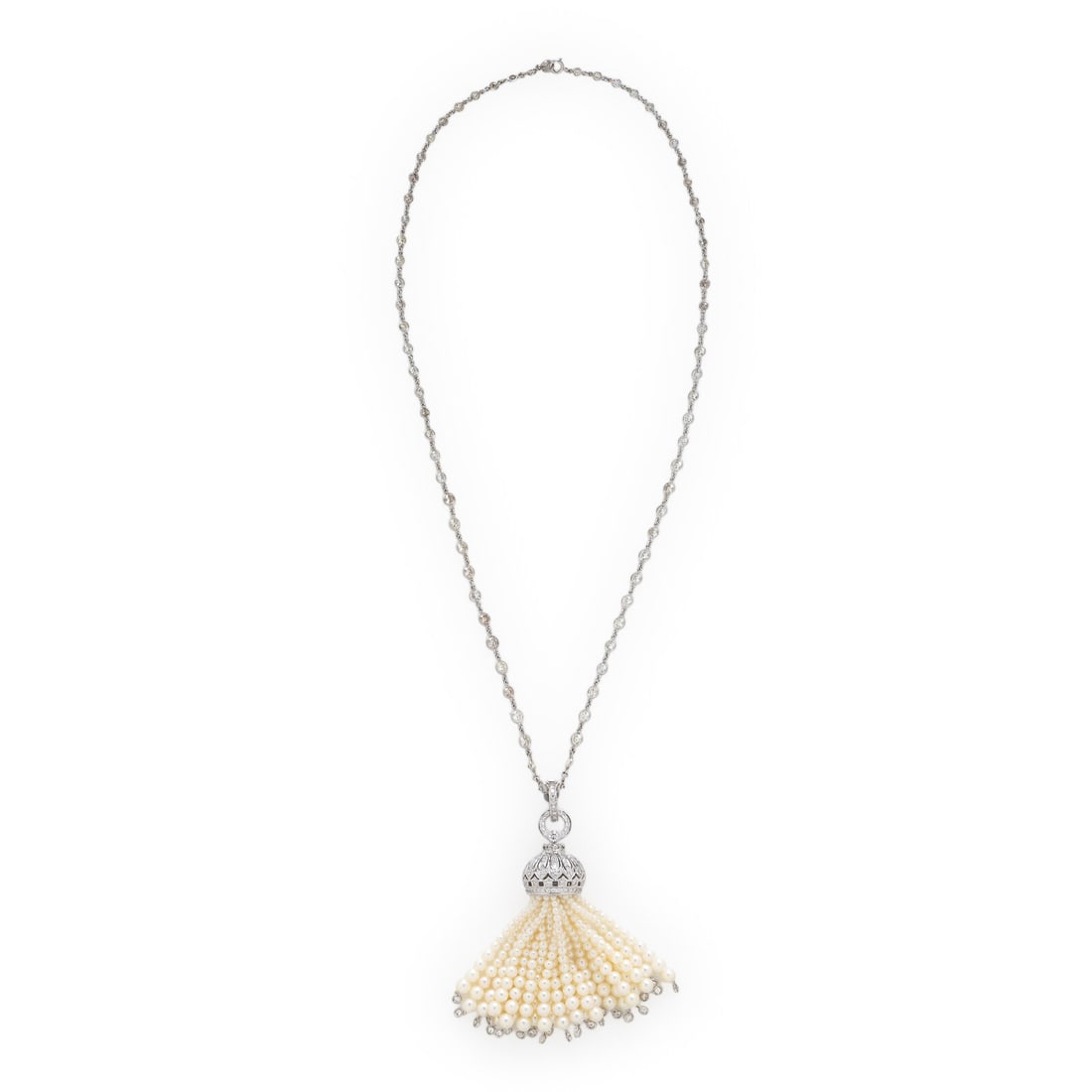 Diamond and Seed Pearl Tassel Necklace: Diamond and Seed Pearl Tassel Necklace Featuring a seed pearl tassel pendant on a graduating diamond station necklace, set throughout with round brilliant cut diamonds weighing approximately 13.20 car