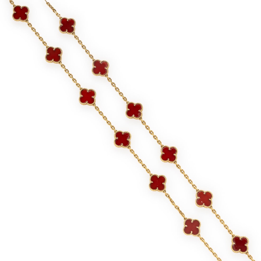 Van Cleef & Arpels, Carnelian and Yellow Gold 'Alhambra' Necklace: Van Cleef & Arpels, Carnelian and Yellow Gold 'Alhambra' Necklace Set with 20 quatrefoil carnelian stations measuring approximately 14 mm, the detachable extender with one additional station. Mounted 