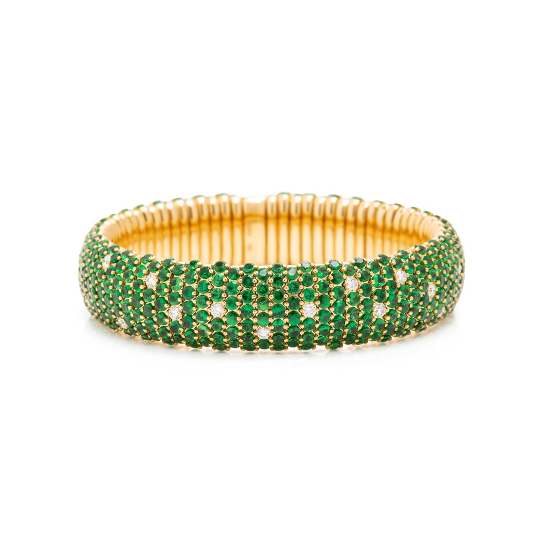 Zydo, Tsavorite Garnet, Diamond, and Yellow Gold Flexible Bangle Bracelet: Zydo, Tsavorite Garnet, Diamond, and Yellow Gold Flexible Bangle Bracelet In a flexible design, set with round brilliant cut diamonds weighing approximately 1.10 carats total and round tsavorite garne