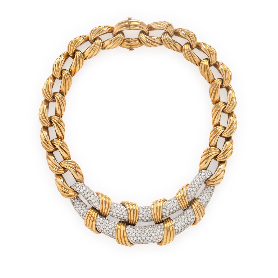 Bicolor Gold and Diamond Necklace: Bicolor Gold and Diamond Necklace Designed with stylized curb links, with a central motif of partially articulated links pavé-set with round brilliant cut diamonds weighing approximately 13.00 - 
