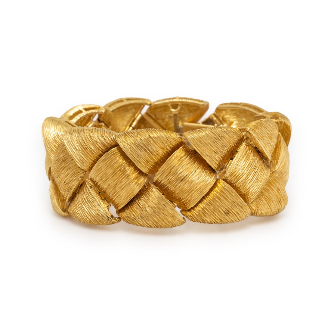 Henry Dunay, 'Sabi' Yellow Gold Woven Bracelet: Henry Dunay, 'Sabi' Yellow Gold Woven Bracelet In a basket weave design, of hinged links with a 'Sabi' textured finish. 18 karat yellow gold. 6 5/8 inches long, 1 inch wide. Stamp: Dunay 18K. Gross we