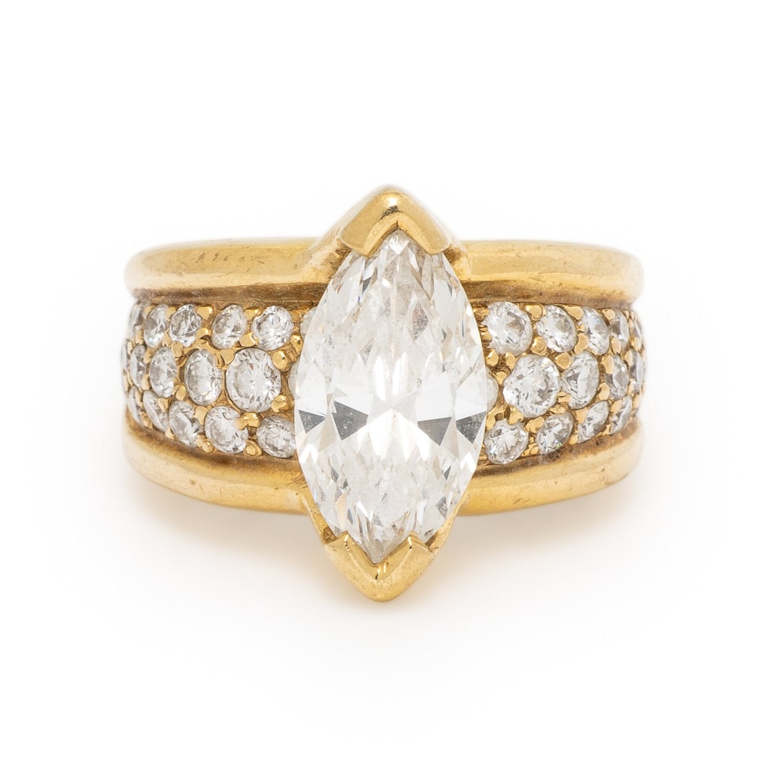 Diamond and Yellow Gold Ring: Diamond and Yellow Gold Ring Featuring a marquise cut diamond weighing 3.00 carats, the shank pavé-set with round brilliant cut diamonds weighing approximately 1.70 carats total. Mounted in 18 ka