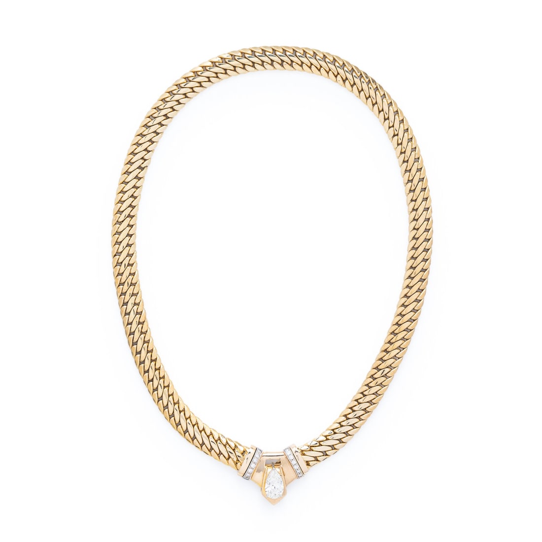 Diamond and Yellow Gold Convertible Chain Necklace: Diamond and Yellow Gold Convertible Chain Necklace Featuring a pear shape diamond weighing 3.02 carats, set in a detachable pendant with additional round brilliant cut diamonds. 14 karat yellow gold. 
