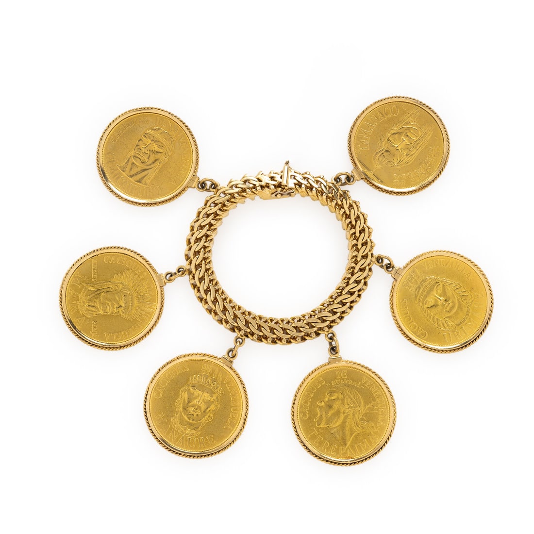 Yellow Gold 'Caciques de Venezuela' Coin Bracelet: Yellow Gold 'Caciques de Venezuela' Coin Bracelet Featuring six yellow gold coins from the 'Caciques de Venezuela' series. Mounted in 18 karat yellow gold on an 18 karat yellow gold bracelet. 7 1/2 in