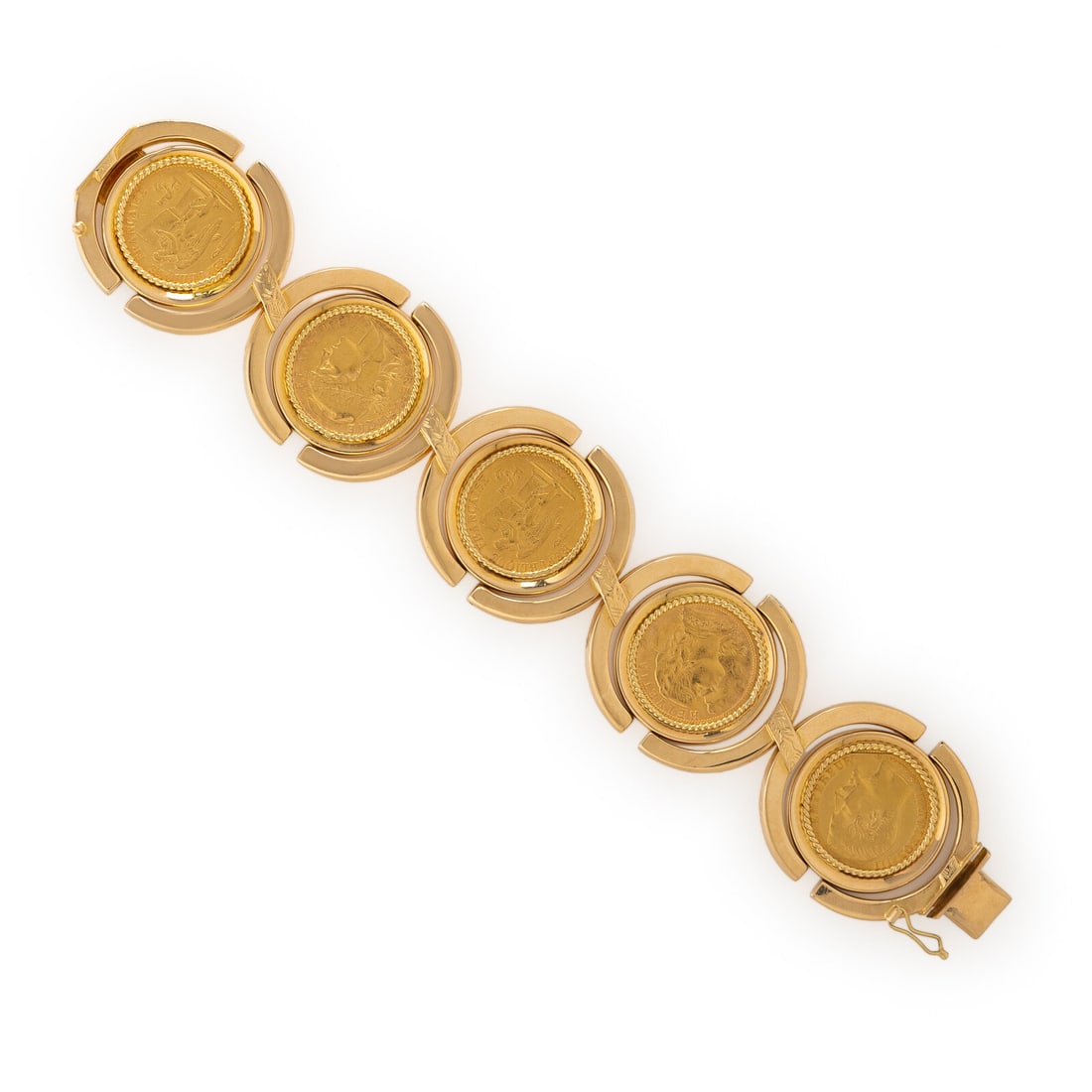 Yellow Gold Coin Bracelet: Yellow Gold Coin Bracelet Set with five bezel mounted 20 franc coins, in hinged frames. Mounted in 18 karat yellow gold. 7 1/4 inches long. Stamp: (obscured hallmark) 750. Gross weight: 47.45 dwt. Pro