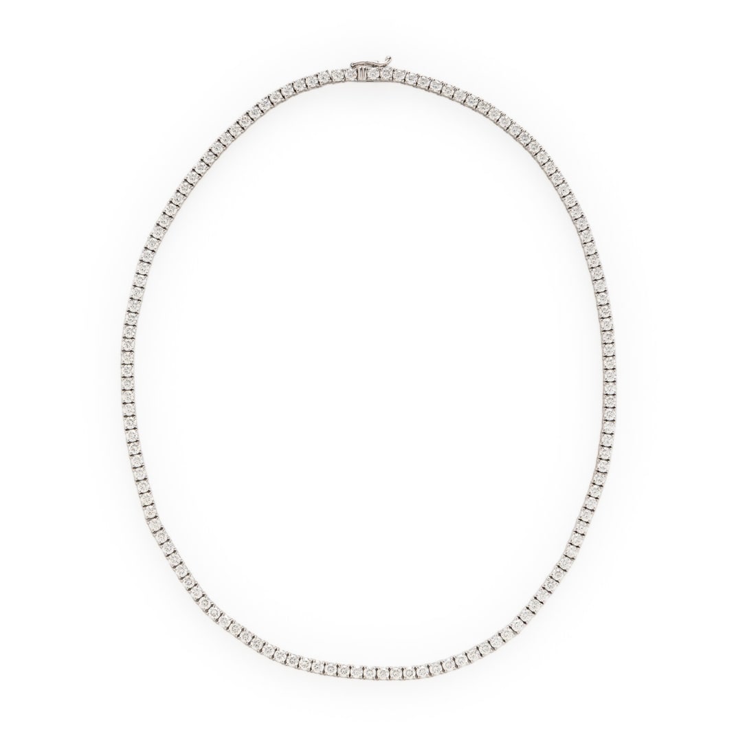 Diamond and White Gold Line Necklace: Diamond and White Gold Line Necklace Featuring round brilliant cut diamonds weighing approximately 11.52 carats total. Mounted in 14 karat white gold. 16 1/2 inches long. Stamp: 14K D11.52. Gross weig