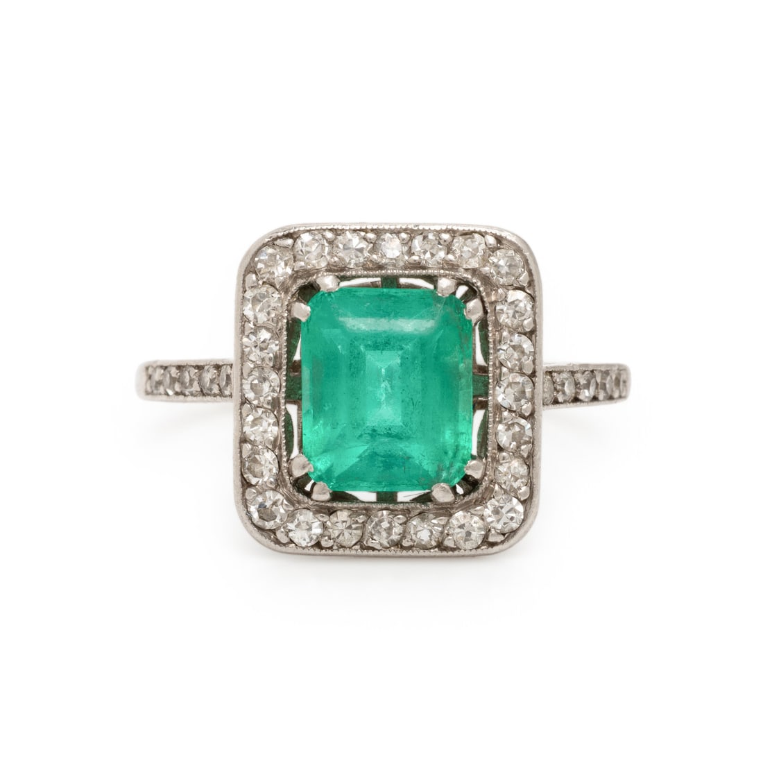 Art Deco, French, Colombian Emerald, Diamond, and Platinum Ring: Art Deco, French, Colombian Emerald, Diamond, and Platinum Ring Featuring an emerald cut emerald weighing approximately 1.35 carats by formula, the mounting set with single cut diamonds weighing appro