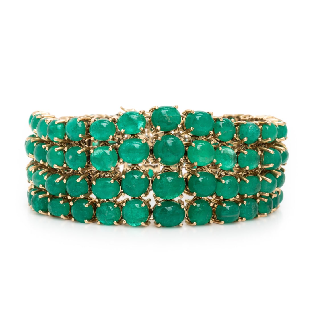 Emerald and Yellow Gold Bracelet: Emerald and Yellow Gold Bracelet Set with four rows of round and oval cabochon emeralds, the smallest weighing approximately 0.30 carat by formula and the largest weighing approximately 2.60 carats by