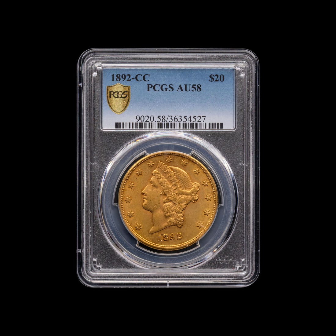 An 1892-CC Liberty Head $20 Gold Coin [PCGS AU58]: An 1892-CC Liberty Head $20 Gold Coin [PCGS AU58] This lot is located in Chicago.