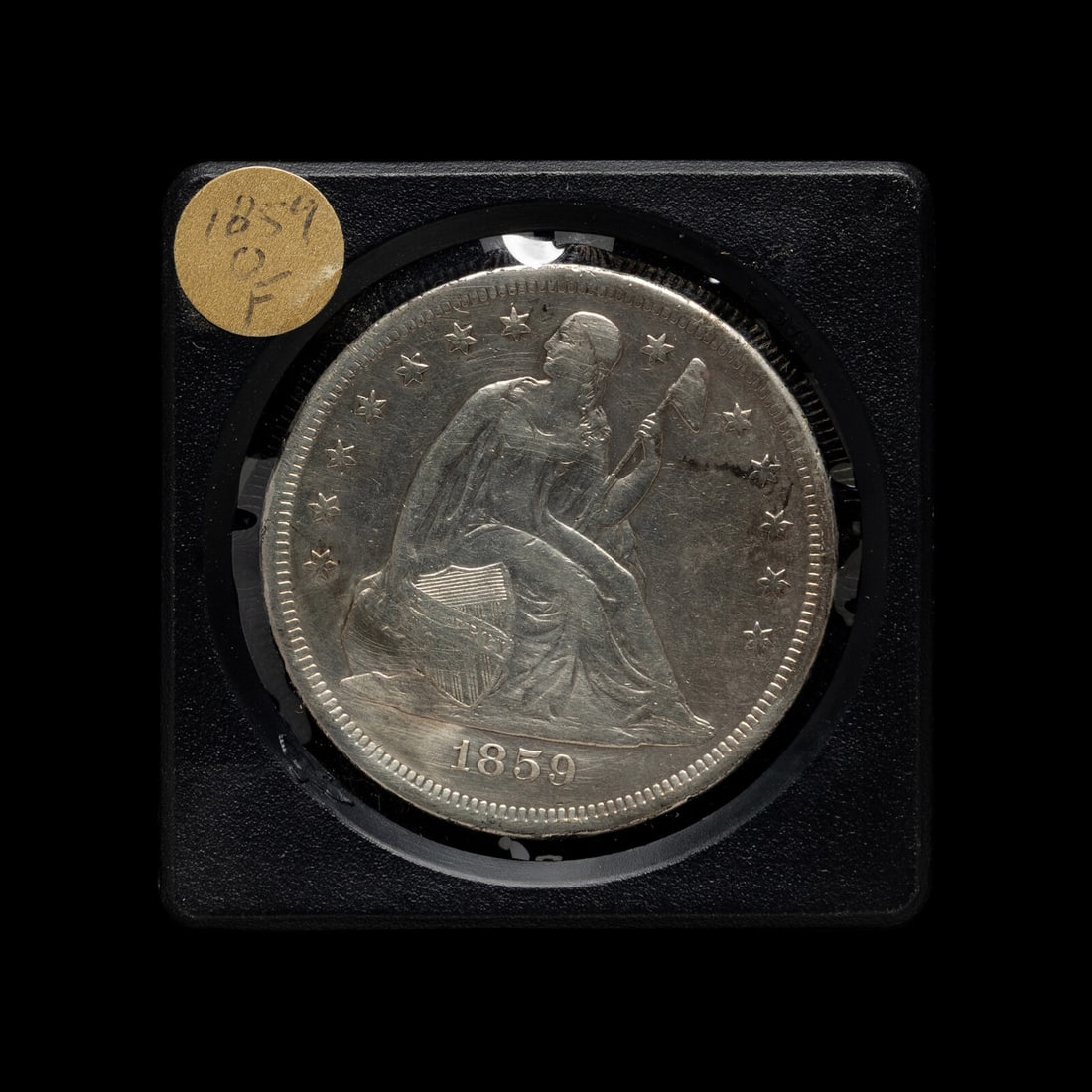An 1859-O Seated Liberty $1 Coin (1 of 2)