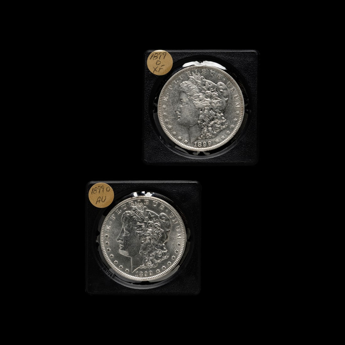Two 1899-O Morgan $1 Coins (1 of 2)