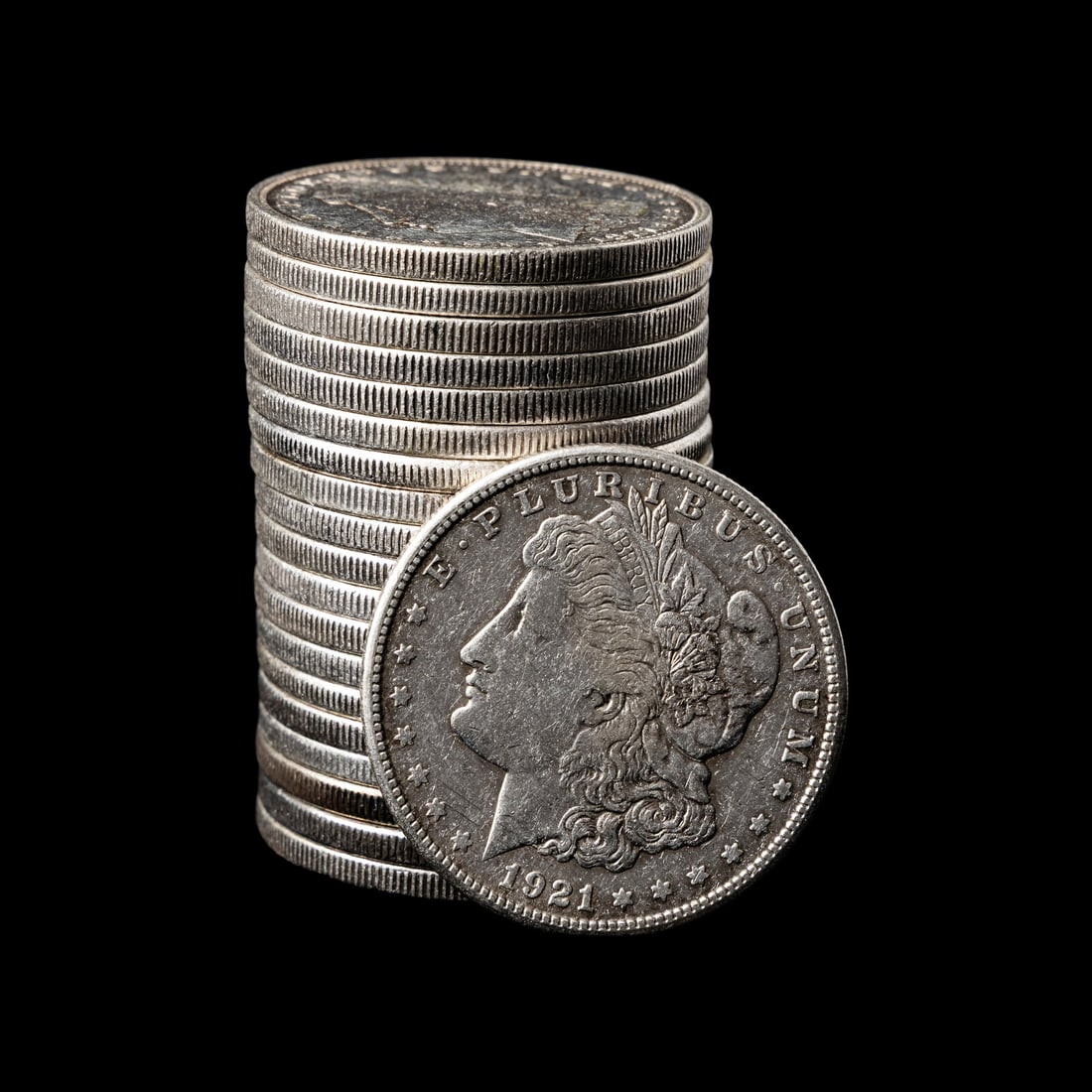 A Group of Twenty Morgan $1 Coins: A Group of Twenty Morgan $1 Coins comprising: 1879 (x2), 1879-O, 1880-O, 1880-S, 1881-O (x2), 1881-S 1883-O, 1884 (x2), 1885, 1886, 1887, 1889-O, 1901-O, 1921 (x2), 1921-D and 1921-S examples. This lo