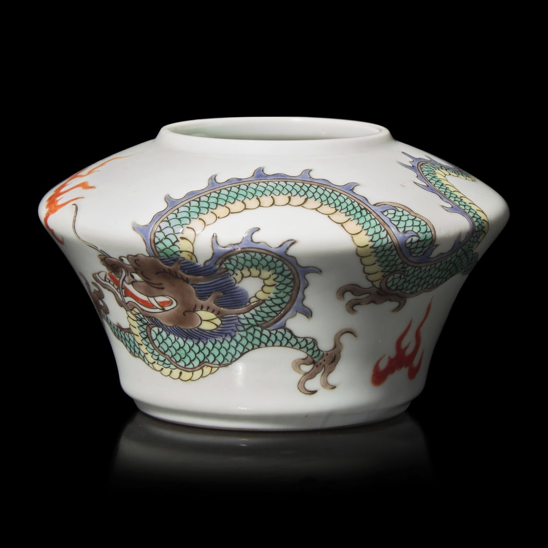 A Chinese Famille Verte "Dragon" Water Coup: A Chinese Famille Verte "Dragon" Water Coup 五彩龍紋水丞 Decorated with a sinuous dragon chasing a flaming pearl. Height 2 1/2 in., 3.1 cm. This lot is located in P