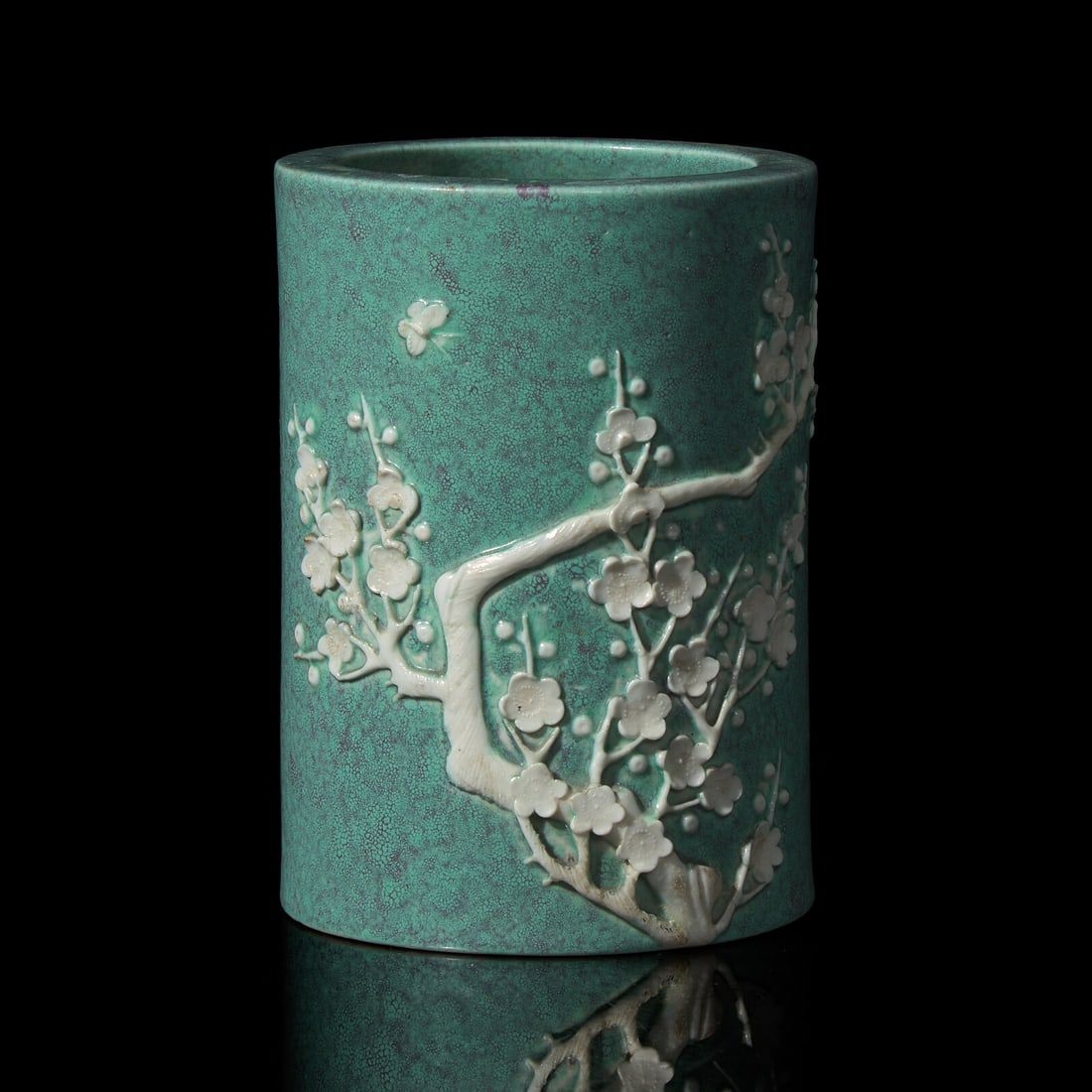 A Chinese "Robin's-Egg" Glazed Porcelain Brushpot, Qing Dynasty, Probably 19th Century: A Chinese "Robin's-Egg" Glazed Porcelain Brushpot, Qing Dynasty, Probably 19th Century 清晚期 爐鈞釉貼塑梅花圖筆筒 Embelli