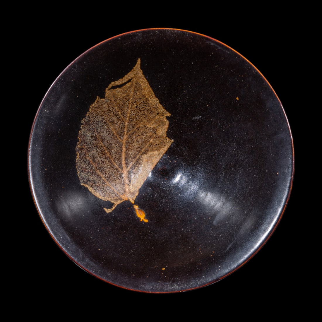 A Chinese Jizhou 'Leaf' Bowl, Possibly Southern Song Dynasty: A Chinese Jizhou 'Leaf' Bowl, Possibly Southern Song Dynasty 或爲南宋 吉州窯木葉盞 The skillfully potted conical bowl in the “bamboo h