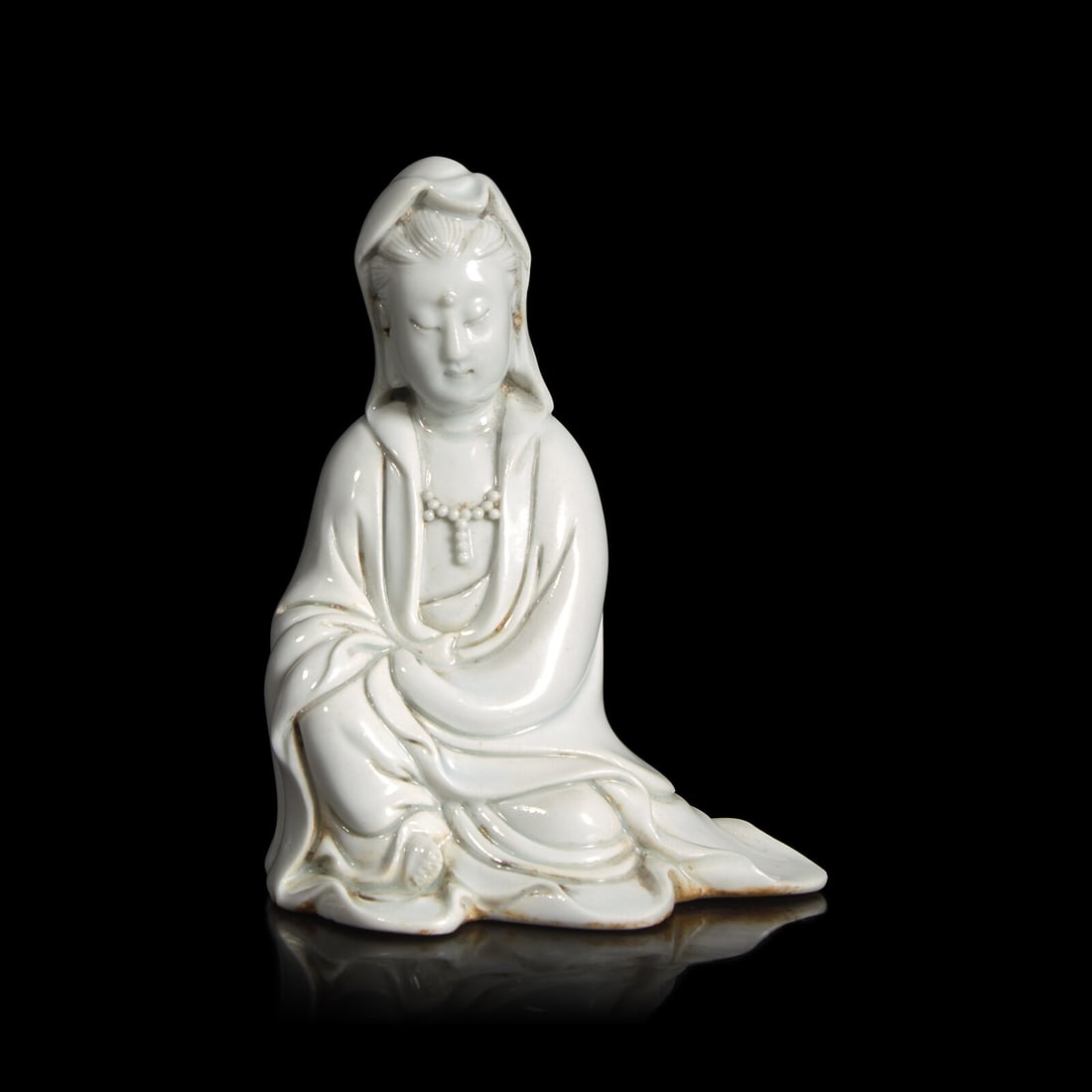 A Small Chinese Blanc de Chine Figure of Guanyin, Qing Dynasty (1 of 3)