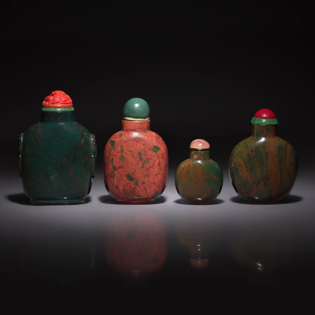 Three Chinese Bloodstone and a "Jasper" Glass Snuff Bottle (4), 18th-19th Century (1 of 2)