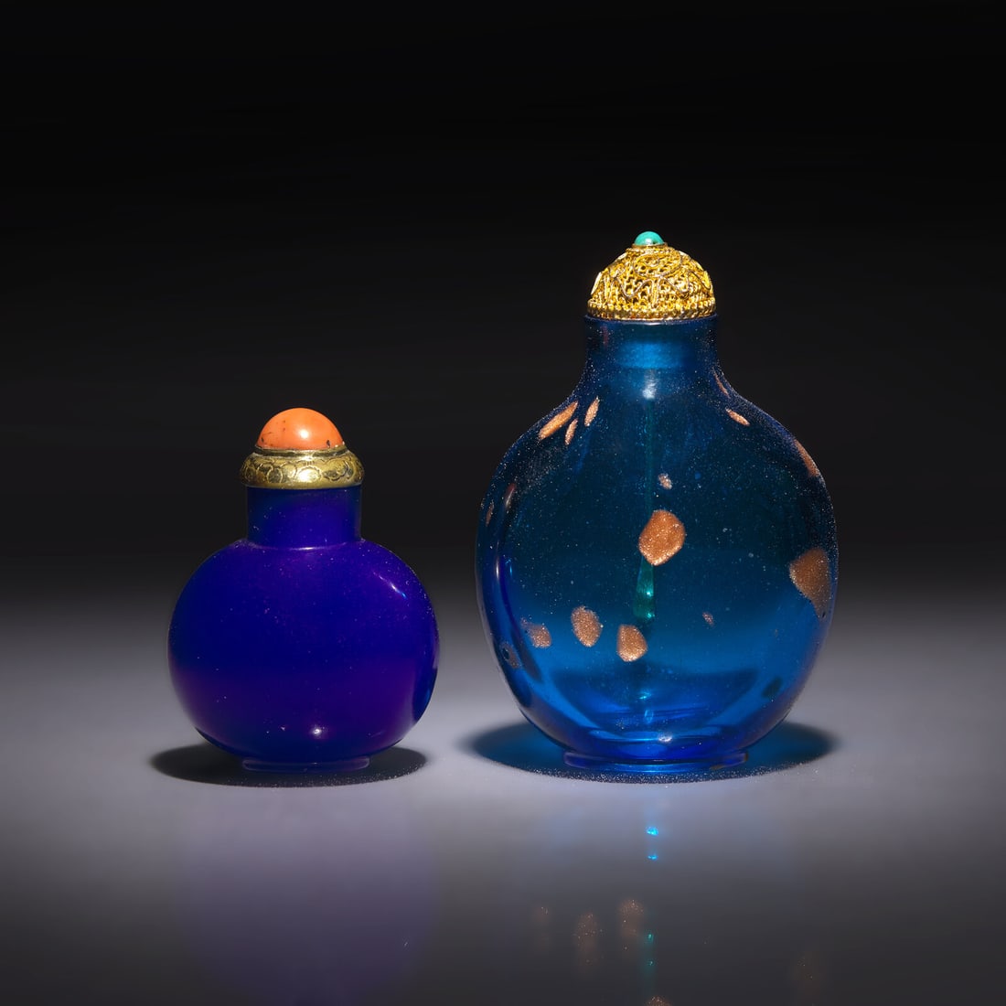 Two Chinese Glass Snuff Bottles, 18th/19th Century: Two Chinese Glass Snuff Bottles, 18th/19th Century 清中期 藍料鼻烟壺兩支 -The first, circa 1720-1840, of miniature round-ovoid form, with a 
