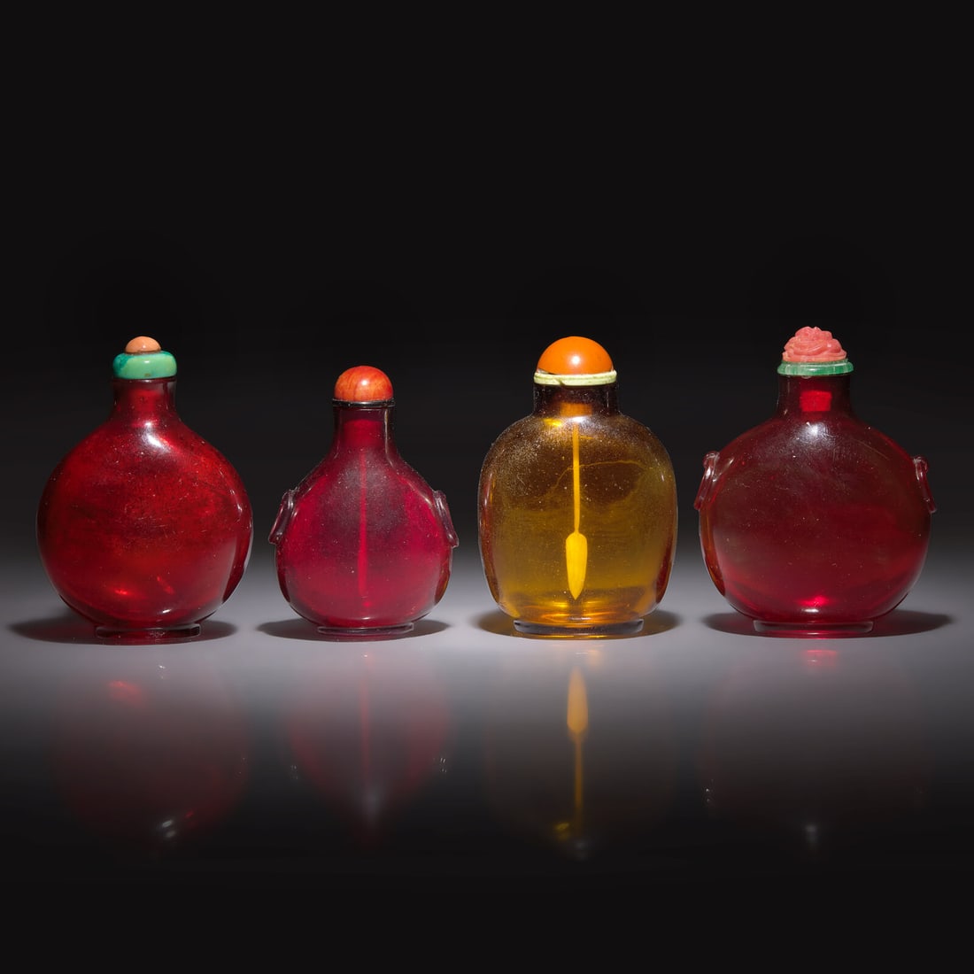 Four Chinese Ruby and Amber Glass Snuff Bottles (1 of 2)