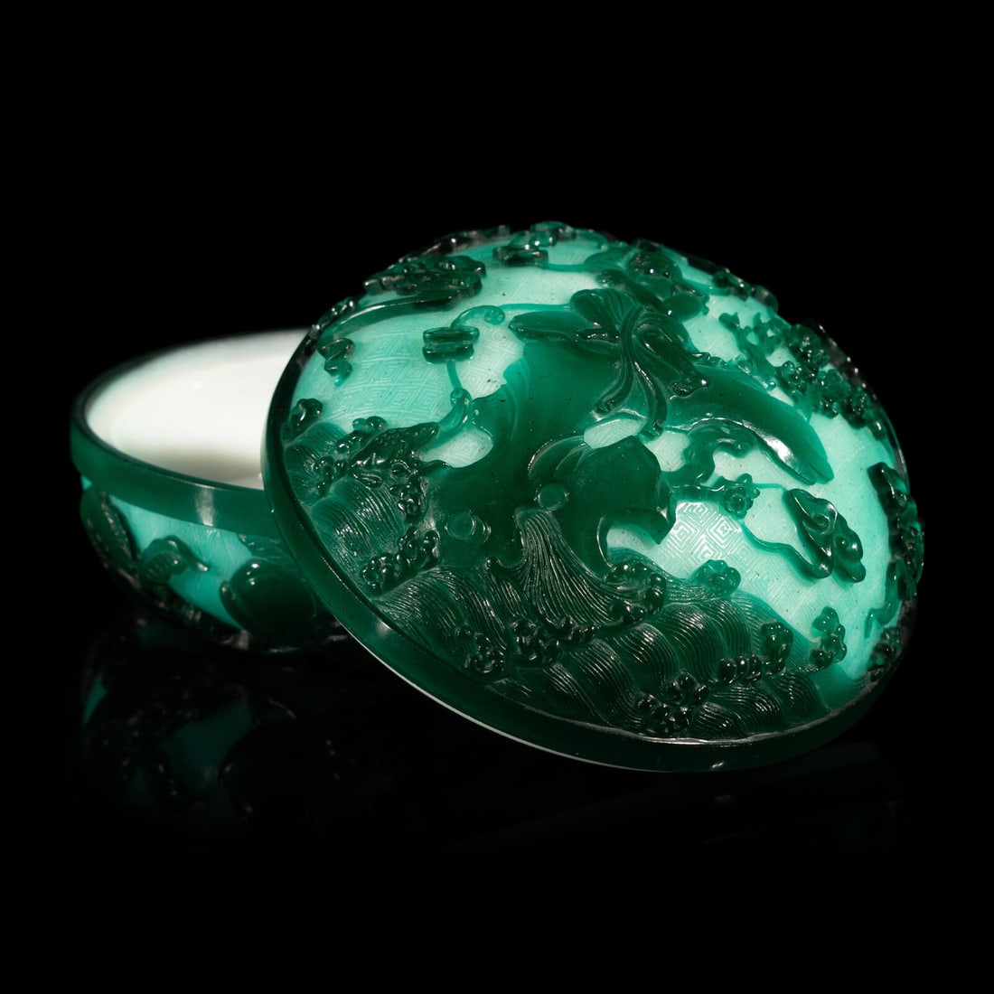 A Chinese Green Overlay Opaque Peking Glass Box and Cover: A Chinese Green Overlay Opaque Peking Glass Box and Cover 涅白地套墨綠料劉海戯金蟾蓋盒 Carved with Liu Hai among roc