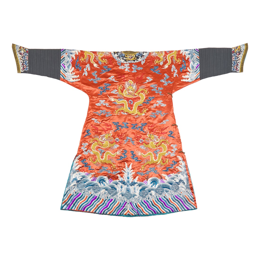 Two Chinese Embroidered Silk Robes, 20th century: Two Chinese Embroidered Silk Robes, 20th century 近代 絲織綢緞長袍兩件 Comprising a red dragon robe decorated with soaring dragons amidst cr