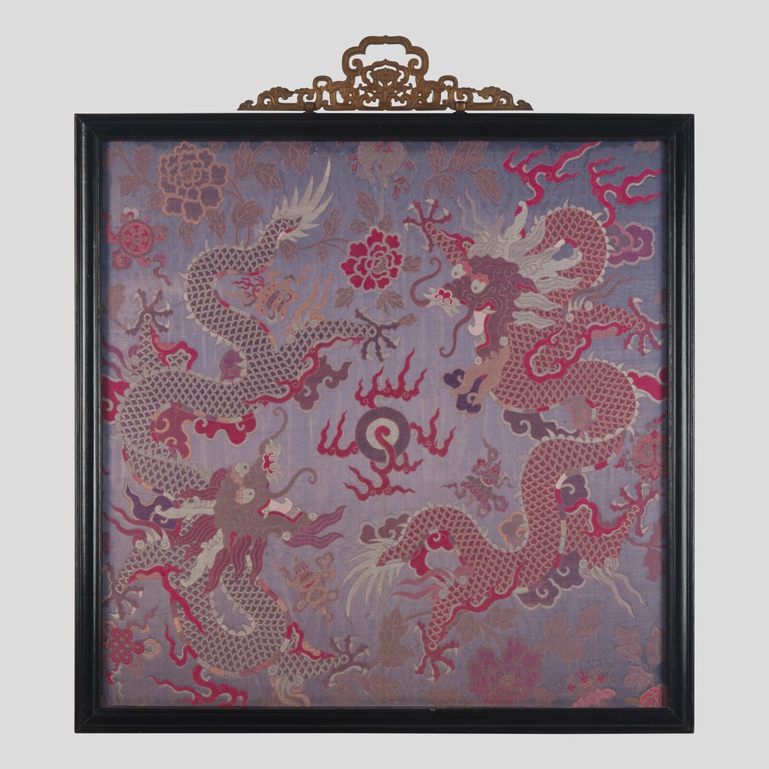 A Large Chinese Woven Silk 'Dragon' Panel, 19th Century: A Large Chinese Woven Silk 'Dragon' Panel, 19th Century 清中期 雙龍戲珠織錦鏡框 Depicting two writhing five-clawed dragons contending 