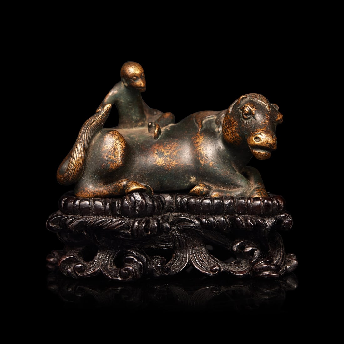 A Chinese Bronze 'Monkey on Horse' Figural Group with Wood Stand: A Chinese Bronze 'Monkey on Horse' Figural Group with Wood Stand 馬上封侯銅鎮紙配木座 Length 2 1/2 in., 6.5 cm. This lot is located in Phila