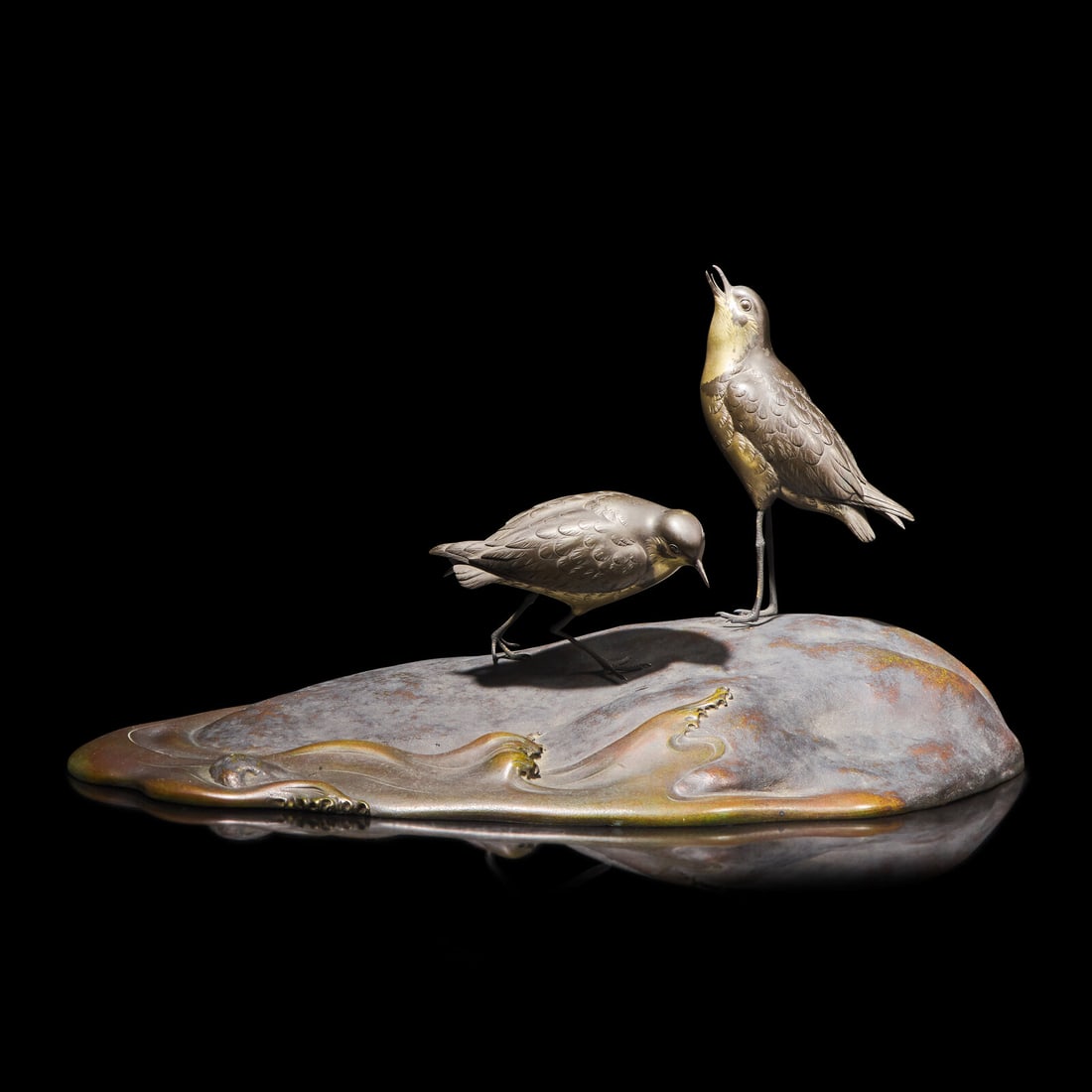 A Japanese Patinated Bronze "Shore Birds" Figural Group, Taisho/Showa Period, Signed: A Japanese Patinated Bronze "Shore Birds" Figural Group, Taisho/Showa Period, Signed Comprising two finely gilt and patinated birds, the base featuring rock and waves, signed on one bird's belly ̶