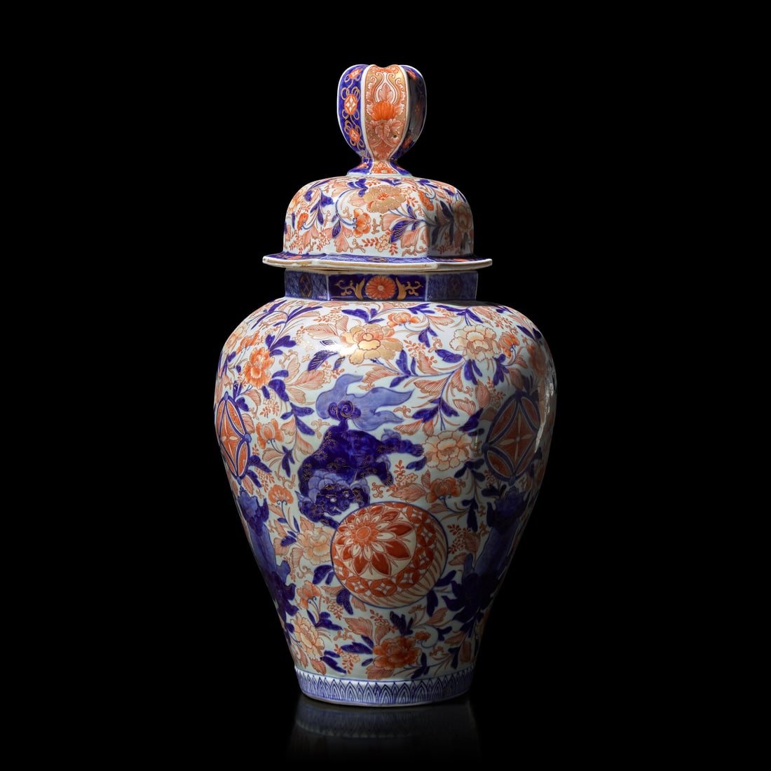 A Japanese Imari Porcelain Jar and Cover, Late Edo-Meiji Period: A Japanese Imari Porcelain Jar and Cover, Late Edo-Meiji Period Of hexagonal facetted baluster form, the domed conforming cover with flared lip and facetted ovoid finial; decorated with shishi, "broca