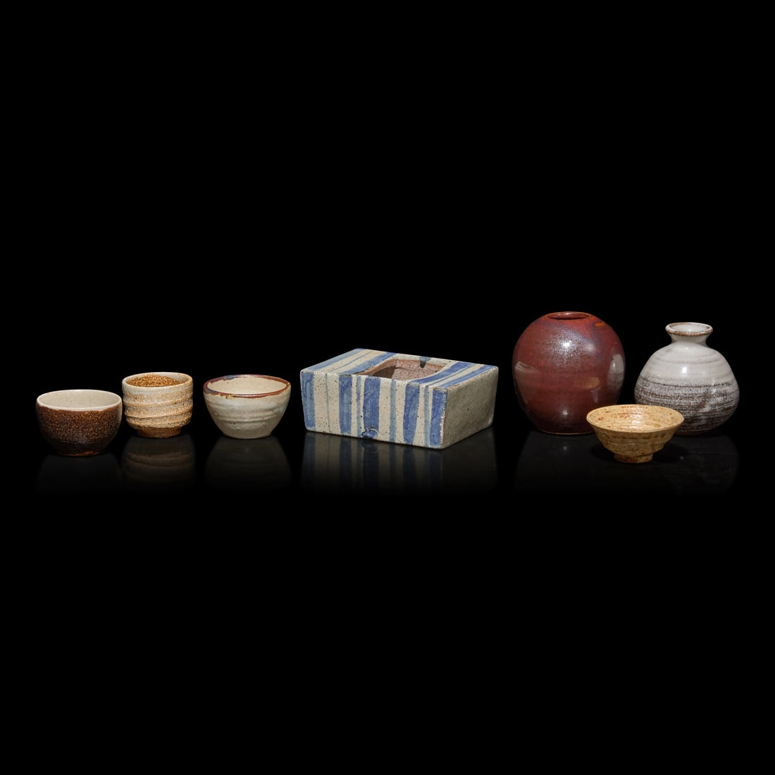 A Group of Seven Assorted Japanese Sake Cups, Small Vases, and a Rectangular Vessel, 20th Century (1 of 5)