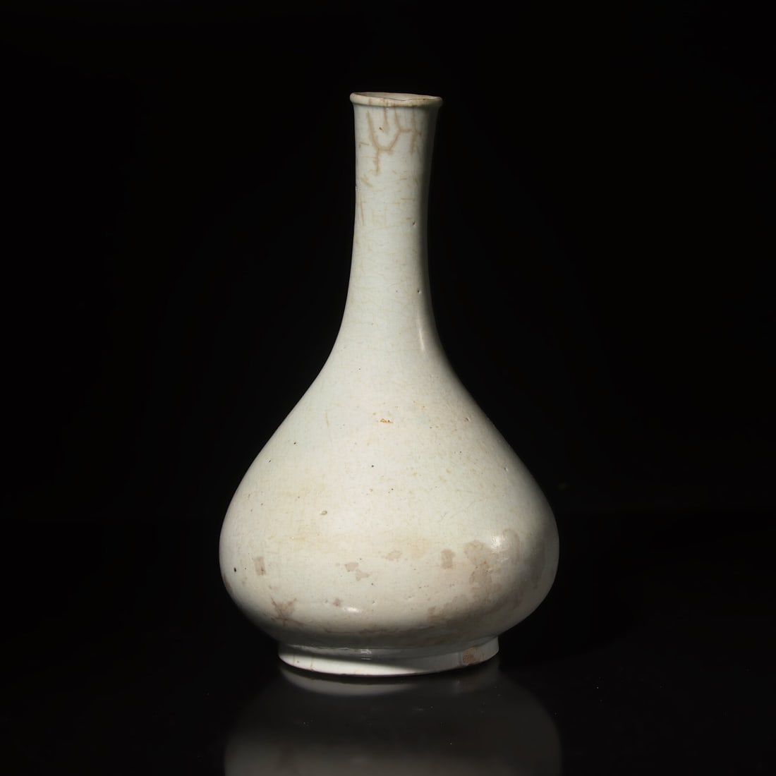 A Korean White Glazed Porcelain Bottle Vase, Joseon Dynasty (1 of 2)