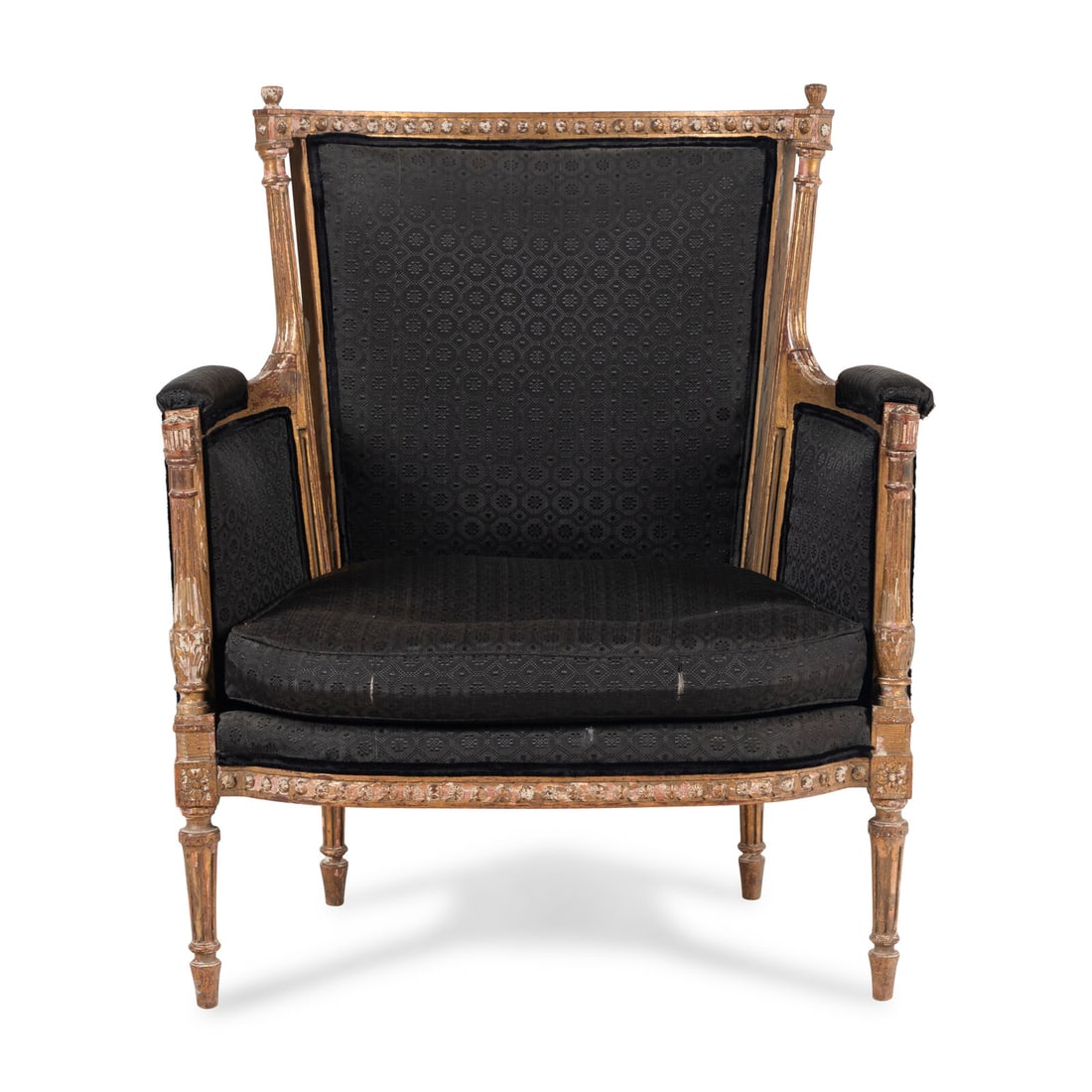 A Louis XVI Style Giltwood BergËre: A Louis XVI Style Giltwood BergËre Late 19th/Early 20th Century Height 38 3/8 x width 33 x depth 24 inches. This lot is located in Chicago.