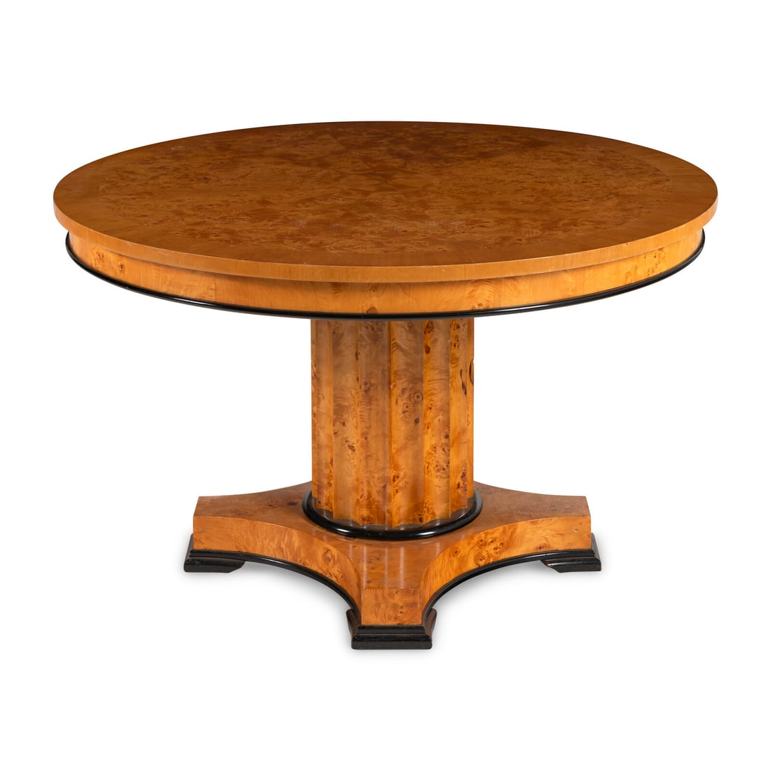 A Biedermeier Style Parcel Ebonized Figured Birch Center Table: A Biedermeier Style Parcel Ebonized Figured Birch Center Table Height 30 x diameter 48 inches. Property of a California Collector This lot is located in Chicago. Provenance Bonhams, Los Angeles, The E