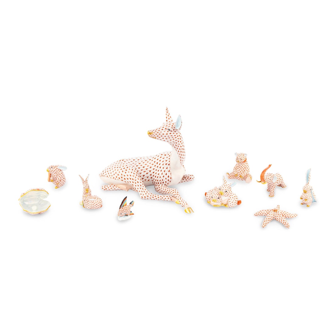 Eight Herend Porcelain 'Rust Fishnet" Figurines: Eight Herend Porcelain 'Rust Fishnet" Figurines Hungary, contemporary Comprising: - Seated bear cub - Small floppy bunny with ear raised - Small floppy bunny with foot raised - Figural group of two bu