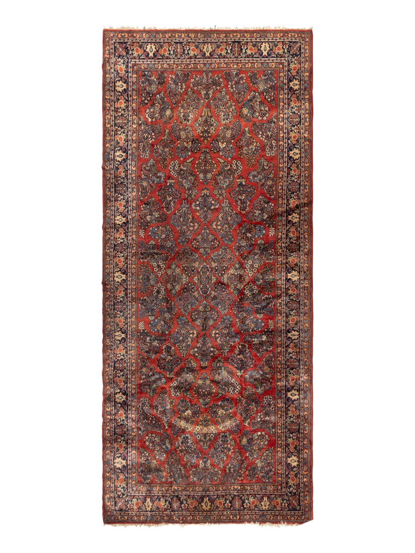 A Sarouk Carpet: A Sarouk Carpet Northwest Persia, Circa 1940 17 feet 4 inches x 7 feet 11 1/2 inches. Property of a California Collector This lot is located in Chicago.