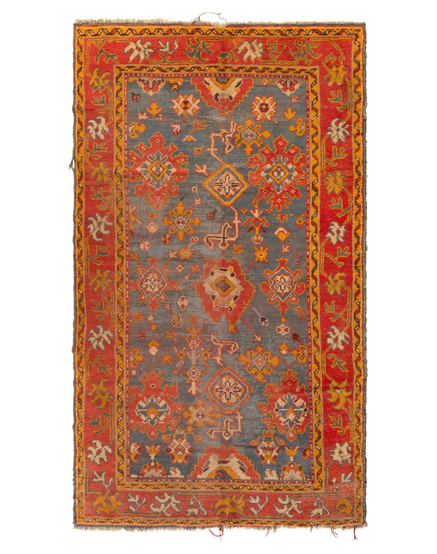 An Oushak Rug: An Oushak Rug Late 19th Century 10 feet 9 inches x 5 feet 11 inches. Property from the Wetherill Family Collection, Main Line, Philadelphia and Ch‚teau de Drouilly, Les Hayes, France This lot is