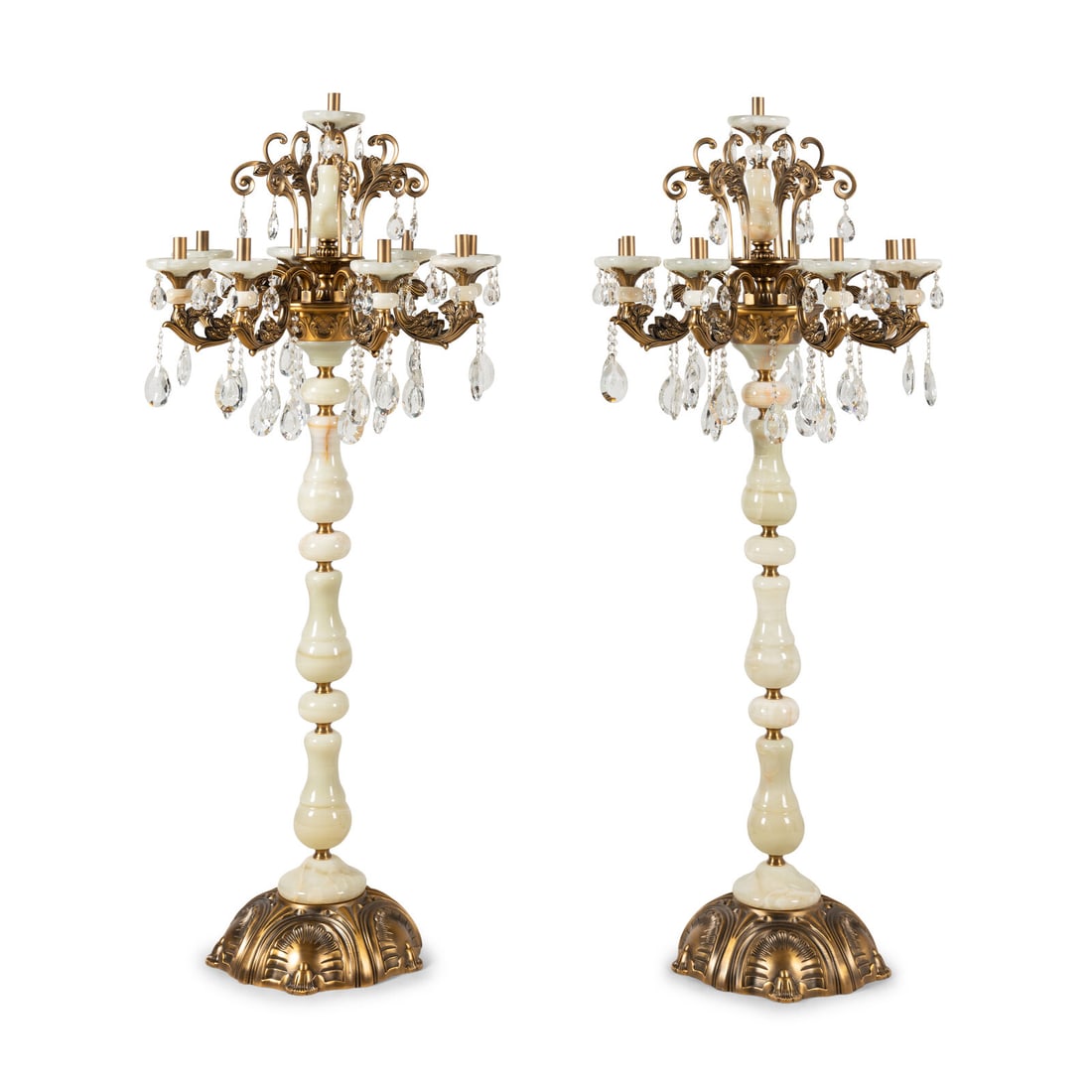 A Pair of Brass Mounted Onyx Nine-Light TorchËres: A Pair of Brass Mounted Onyx Nine-Light TorchËres 20th Century Height 71 x diameter 30 inches. This lot is located in Chicago. Provenance Regis Galerie, Las Vegas, Nevada