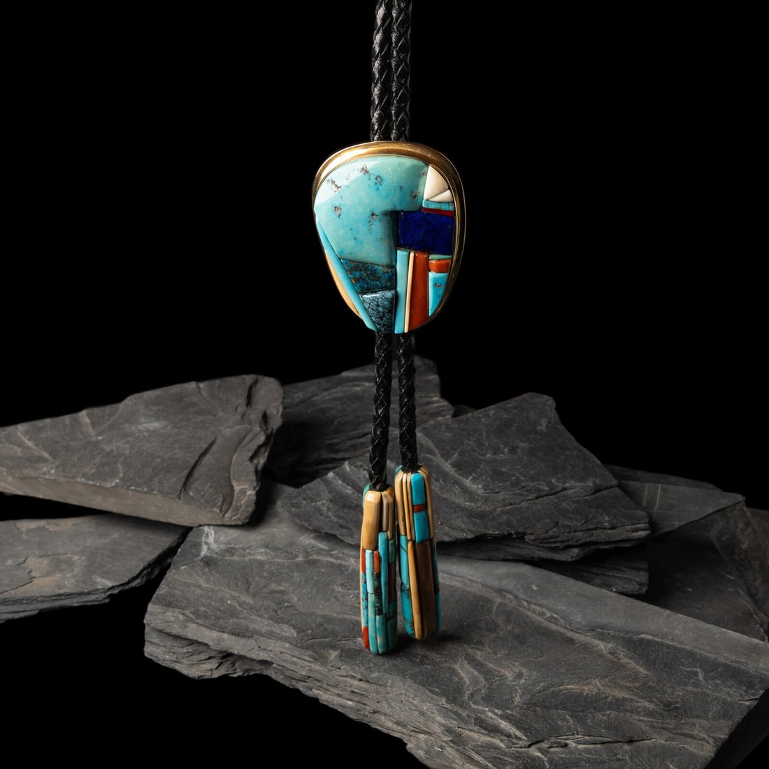Darryl Edwards (American, 20th century) Southwestern-style 14K Gold and Cobblestone Inlay Bolo Tie: Darryl Edwards (American, 20th century) Southwestern-style 14K Gold and Cobblestone Inlay Bolo Tie signed DARRYL EDWARDS and marked 14K slide length 2-5/8 inches x width 2-1/8 inches bolo length 34