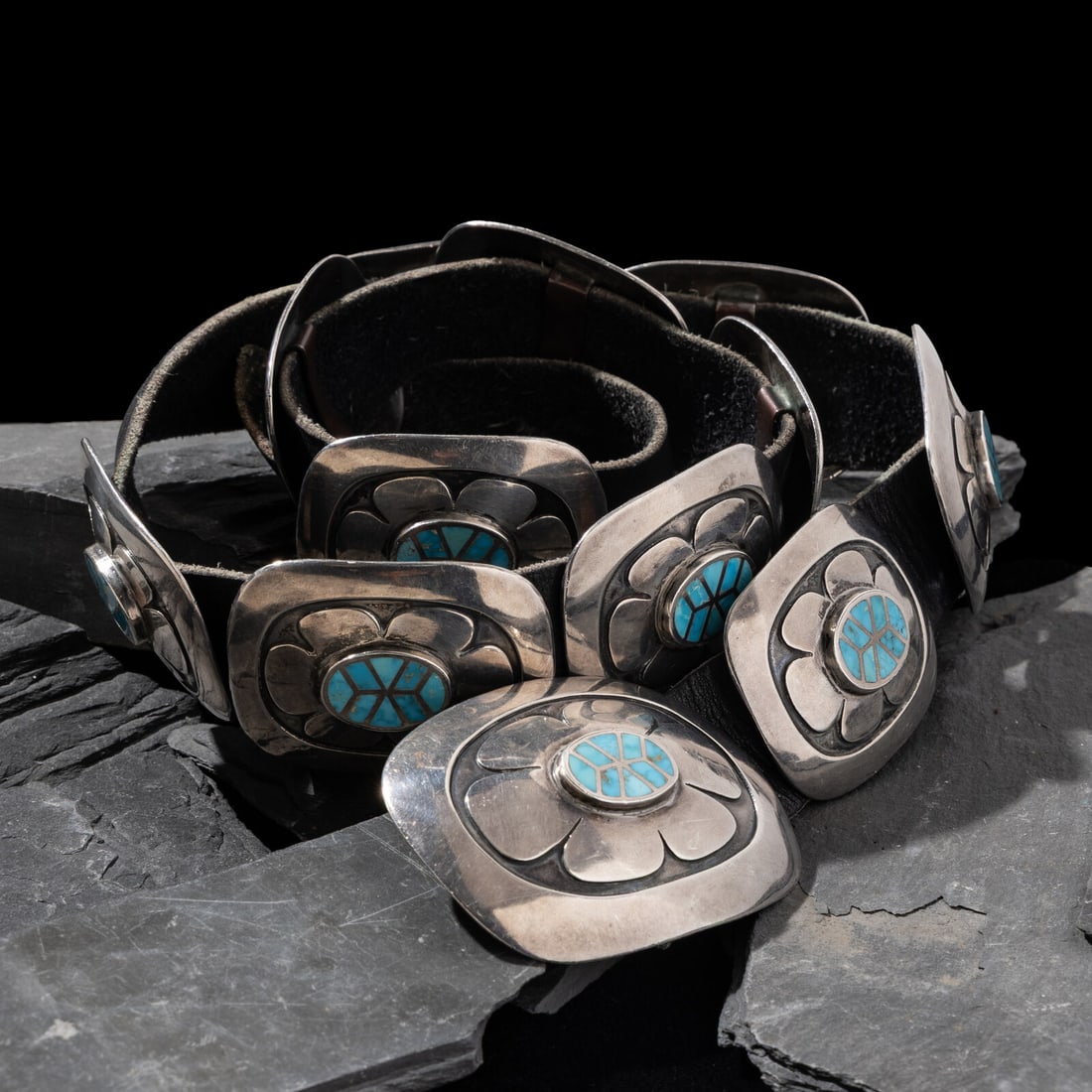 Southwestern Silver and Channel Inlay Turquoise Concha Belt: Southwestern Silver and Channel Inlay Turquoise Concha Belt ca 1940s eleven rectangular conchas and larger matching buckle; not marked concha height 1-5/8 inches x width 2-1/8 inches buckle height 2-1