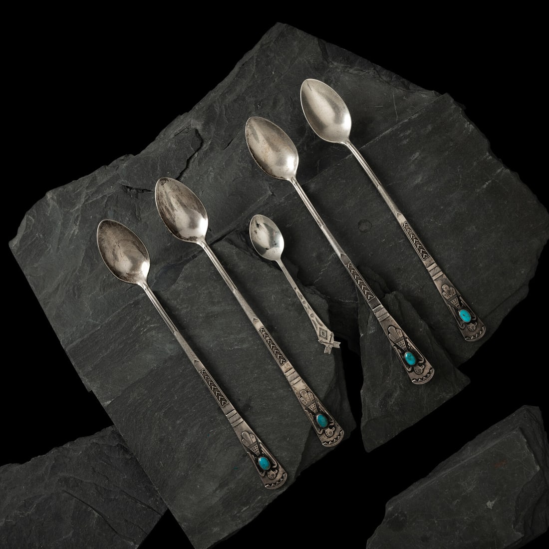 Maisel's Trading Post (Shop, 1923-1960s) Navajo Sterling Silver Route 66 Curio Iced Tea Spoons, PLUS: Maisel's Trading Post (Shop, 1923-1960s) Navajo Sterling Silver Route 66 Curio Iced Tea Spoons, PLUS lot of 5, all marked STERLING with shop mark on back, includes: four iced teas spoons with