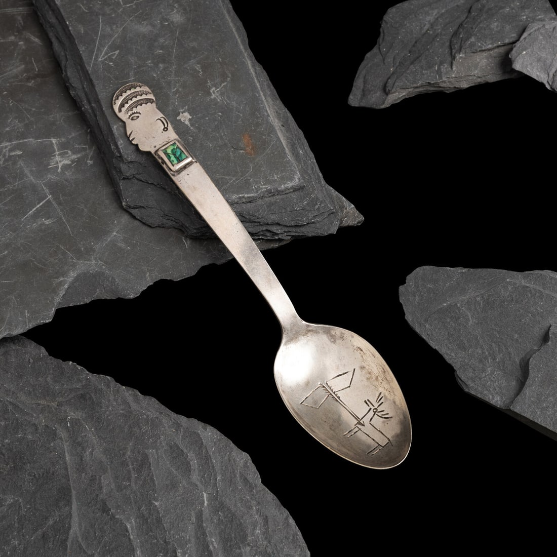 Early Navajo Silver and Turquoise Figural Spoon: Early Navajo Silver and Turquoise Figural Spoon ca 1900 the handle of the spoon features a cutout and stamped figural design and set with a single turquoise stone; the spoon features a chiseled deer a