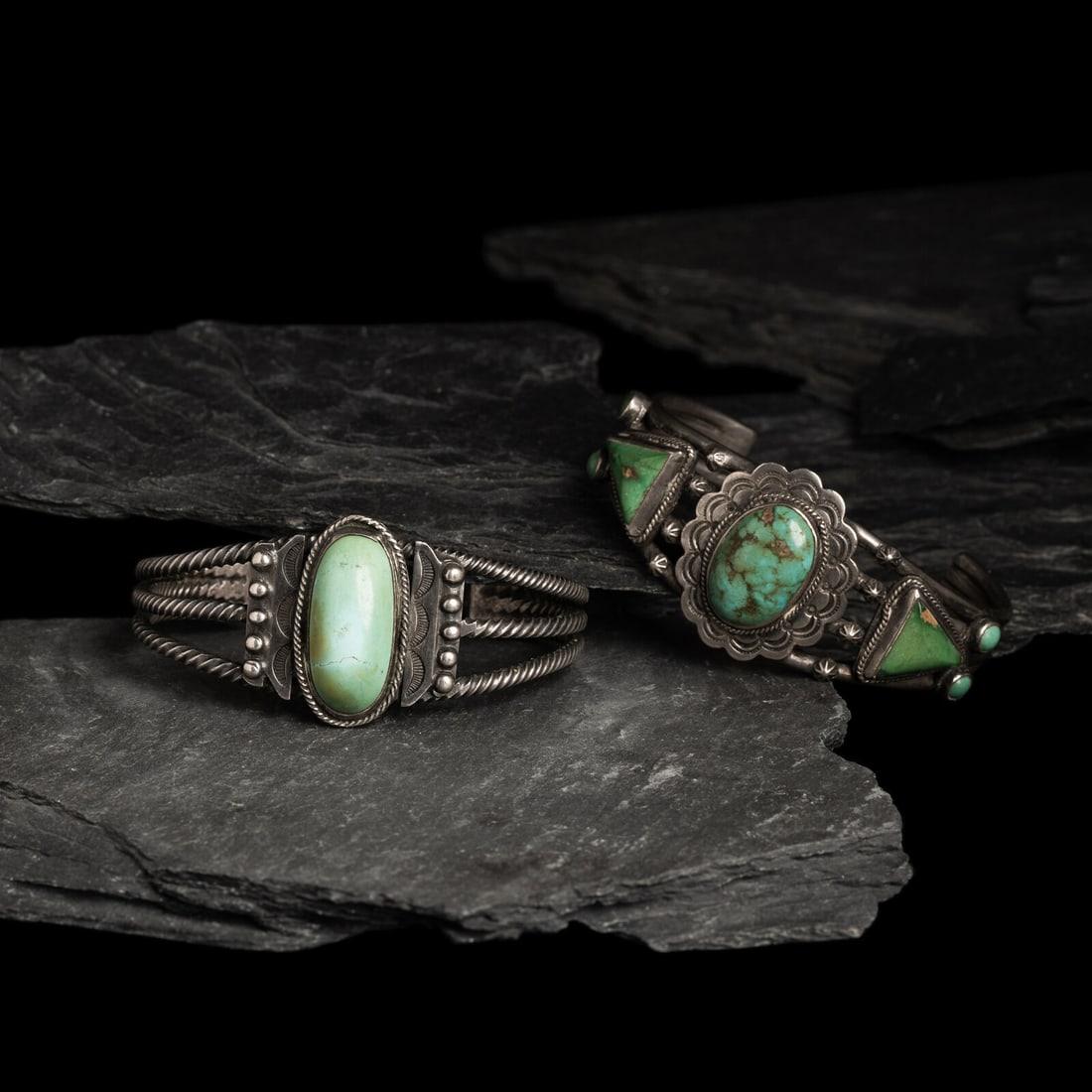 Navajo Silver and Turquoise Cuff Bracelets: Navajo Silver and Turquoise Cuff Bracelets second quarter 20th century lot of 2, neither are marked, includes: four-strand wire cuff set with seven stones in varying shapes width 1-3/8 inches interior