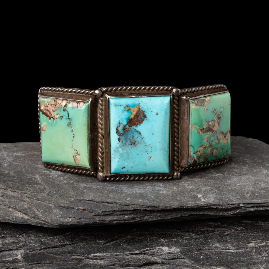 Mark Chee (DinÈ, 1914-1981) Sterling Silver and Turquoise Cuff Bracelet: Mark Chee (DinÈ, 1914-1981) Sterling Silver and Turquoise Cuff Bracelet marked with artist's avian CHEE hallmark STERLING HAND MADE width 1-3/8 inches interior circumference 5-3/8 inches + gap