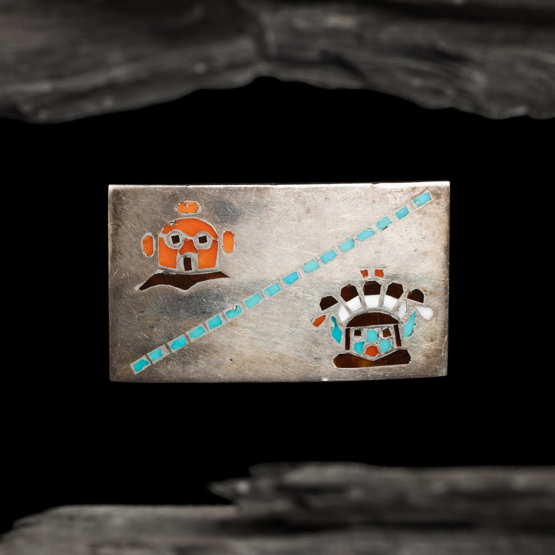 Frank Vacit, Attributed (Zuni, 1915-1999) Silver and Channel Inlay Katsina Belt Buckle: Frank Vacit, Attributed (Zuni, 1915-1999) Silver and Channel Inlay Katsina Belt Buckle featuring a Mudhead and Shalako figure set with turquoise, shell, and coral; not marked height 1-1/4 inches x