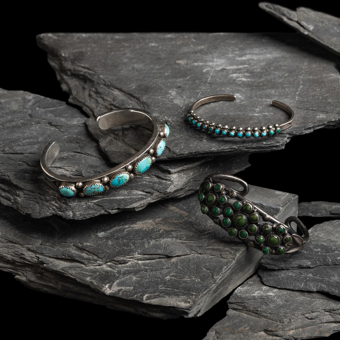 Navajo Silver and Turquoise Cuff Bracelets: Navajo Silver and Turquoise Cuff Bracelets second quarter - mid 20th century lot of 3, none are marked, includes: an example with heavily stamped shank and set with six stones width 3/8 inch interior 