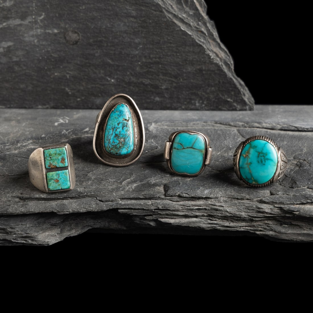 Navajo and Southwestern-style Silver and Turquoise Rings: Navajo and Southwestern-style Silver and Turquoise Rings mid-20th century lot of 4, includes: one set with a double stone, not marked size 9.5 weight 11.1 dwt. one with a stamped and chiseled shank