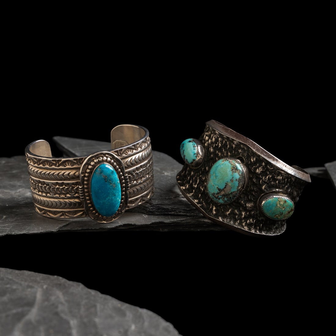 Navajo Wide Silver and Turquoise Cuff Bracelets: Navajo Wide Silver and Turquoise Cuff Bracelets second half 20th century lot of 2, includes: an unmarked example, set with three stones width 2 inches interior circumference 5-5/8 inches + gap length