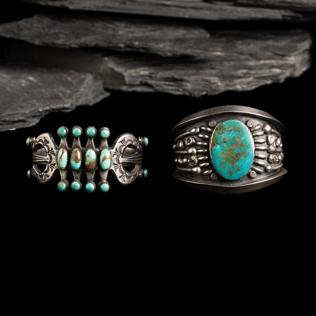 Navajo Silver and Turquoise Cuff Bracelets: Navajo Silver and Turquoise Cuff Bracelets third quarter 20th century lot of 2, includes: one set with a single stone and marked C width 2 inches interior circumference 5-1/4 inches + gap length 1