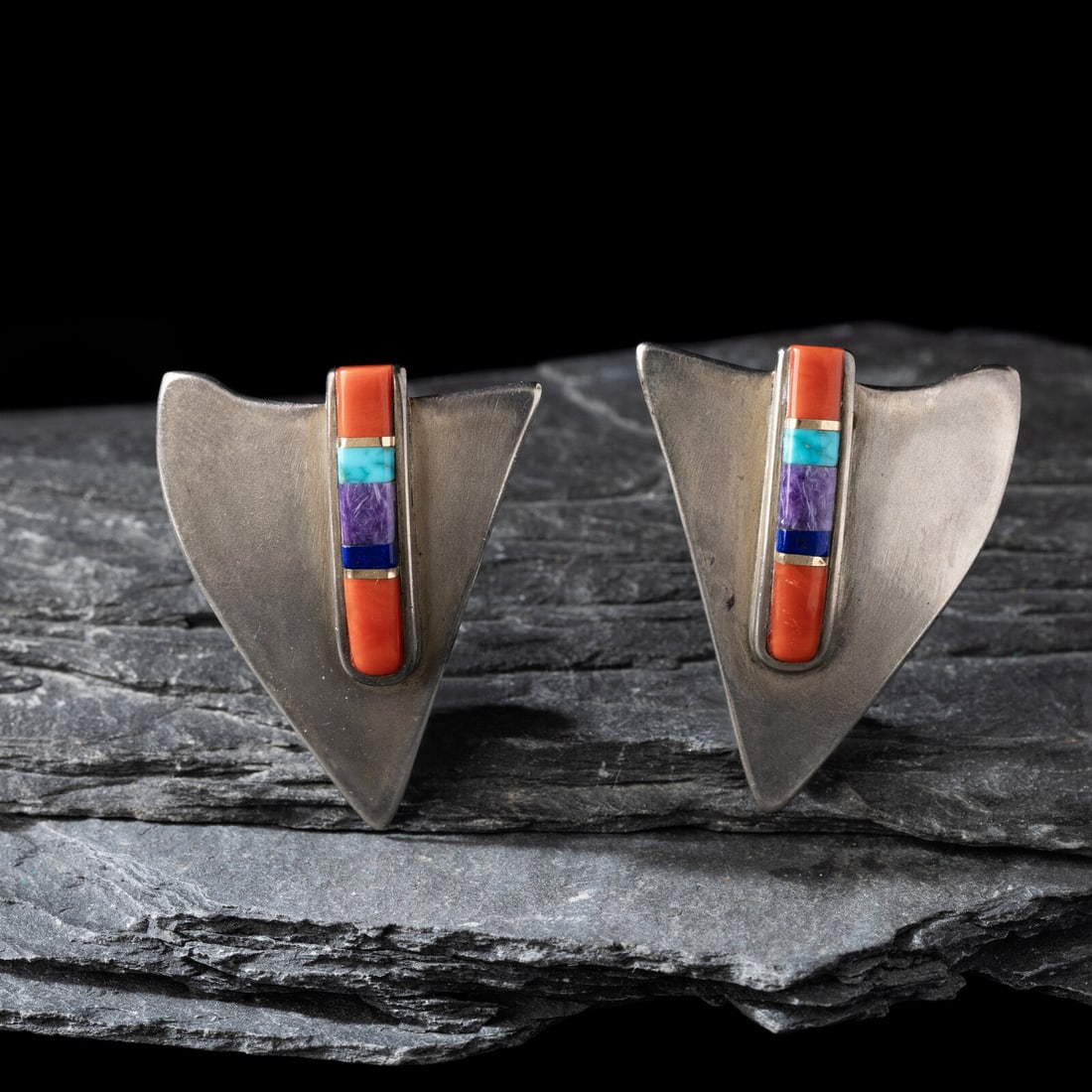 Charles Loloma (Hopi, 1921-1991) Silver and Multi-stone Inlay Shield Clip Earrings: Charles Loloma (Hopi, 1921-1991) Silver and Multi-stone Inlay Shield Clip Earrings set with turquoise, Mediterranean coral, and sugilite with gold spacers; signed with artist's LOLOMA hallmark length 