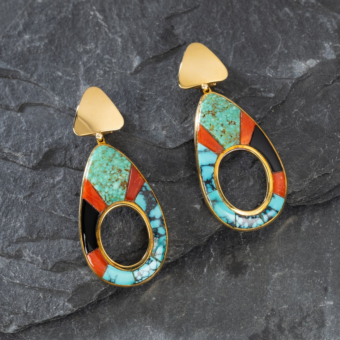 Ben Nighthorse Campbell (Northern Cheyenne, 1933-2025) 18k Gold and Cobblestone Inlay Clip Earrings: Ben Nighthorse Campbell (Northern Cheyenne, 1933-2025) 18k Gold and Cobblestone Inlay Clip Earrings set with turquoise, coral, and jet; marked 18K and signed BEN NIGHTHORSE length 2-1/8 inches x width